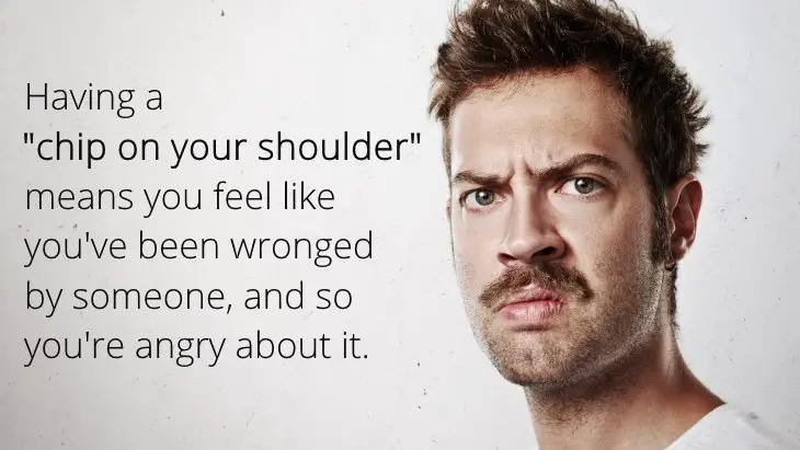 Having a chip on your shoulder - angry man.