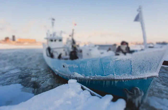 https://knowyourphrase.com/wp-content/uploads/2019/10/ship-breaking-the-ice.jpg