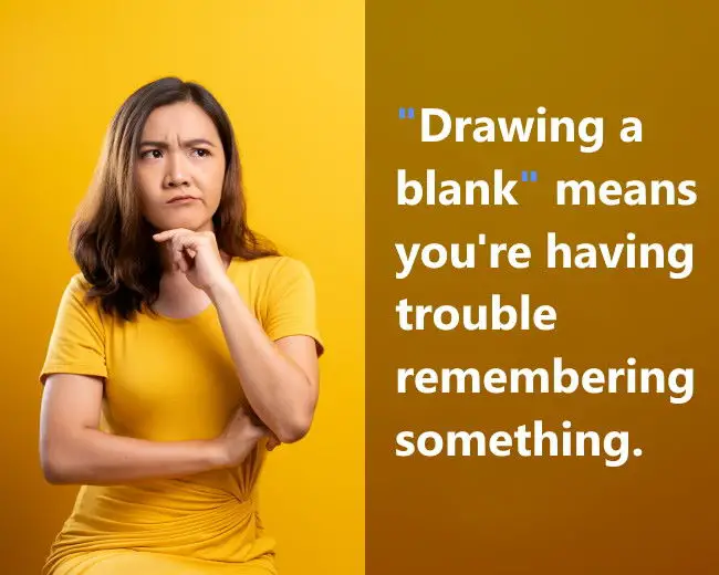 A woman drawing a blank while thinking.